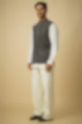 Black Olive Raw Silk Bundi Set by Divyam Mehta Men