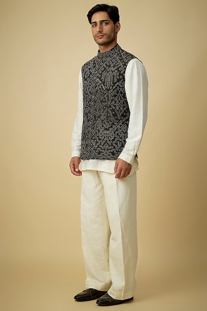 Black Olive Raw Silk Bundi Set by Divyam Mehta Men