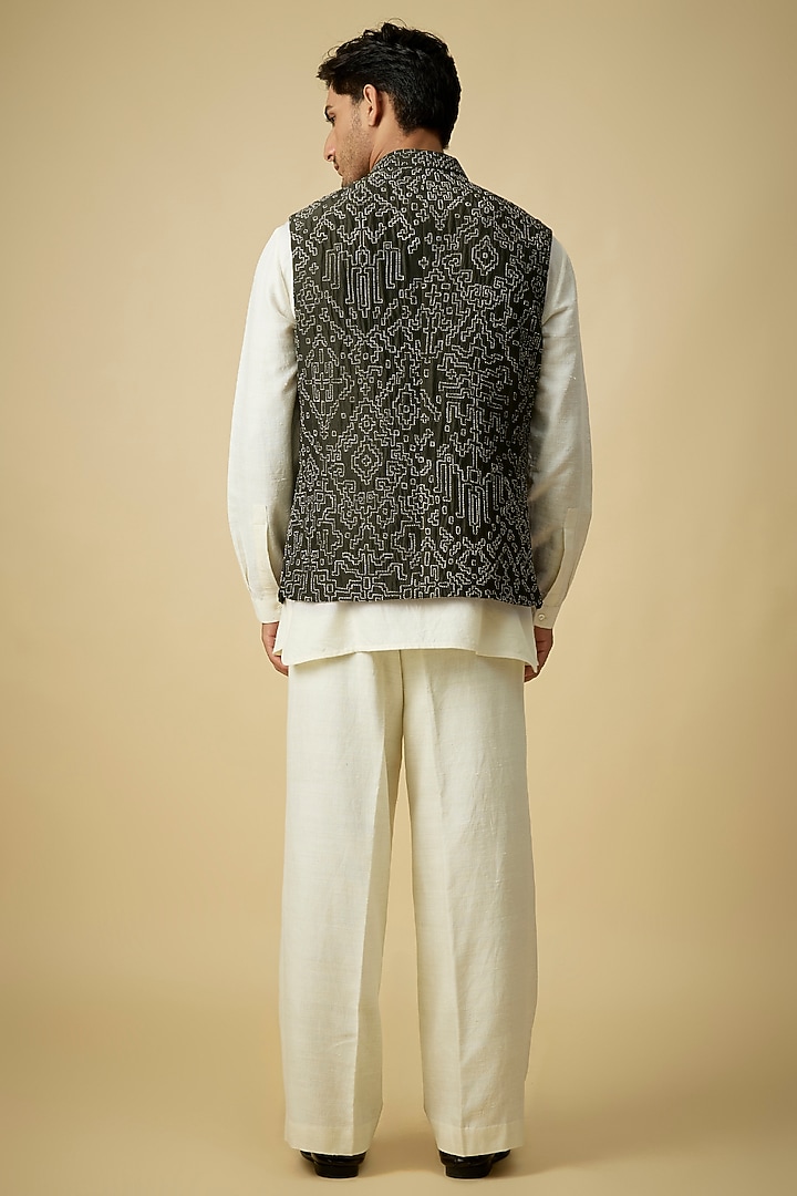 Black Olive Raw Silk Bundi Set by Divyam Mehta Men at Pernia's Pop Up Shop