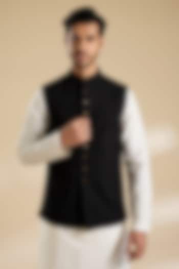 Black Raw Silk Bundi Jacket by Divyam Mehta Men