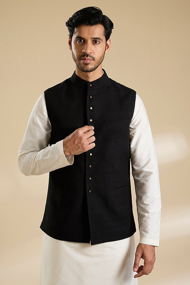 Black Raw Silk Bundi Jacket by Divyam Mehta Men