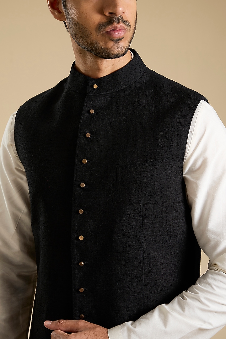 Black Raw Silk Bundi Jacket by Divyam Mehta Men at Pernia's Pop Up Shop