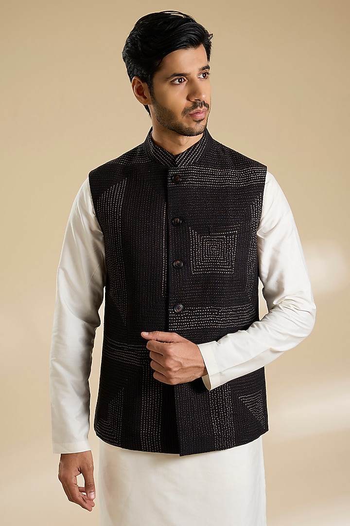 Black Raw Silk Kantha Embroidered Bundi Jacket by Divyam Mehta Men