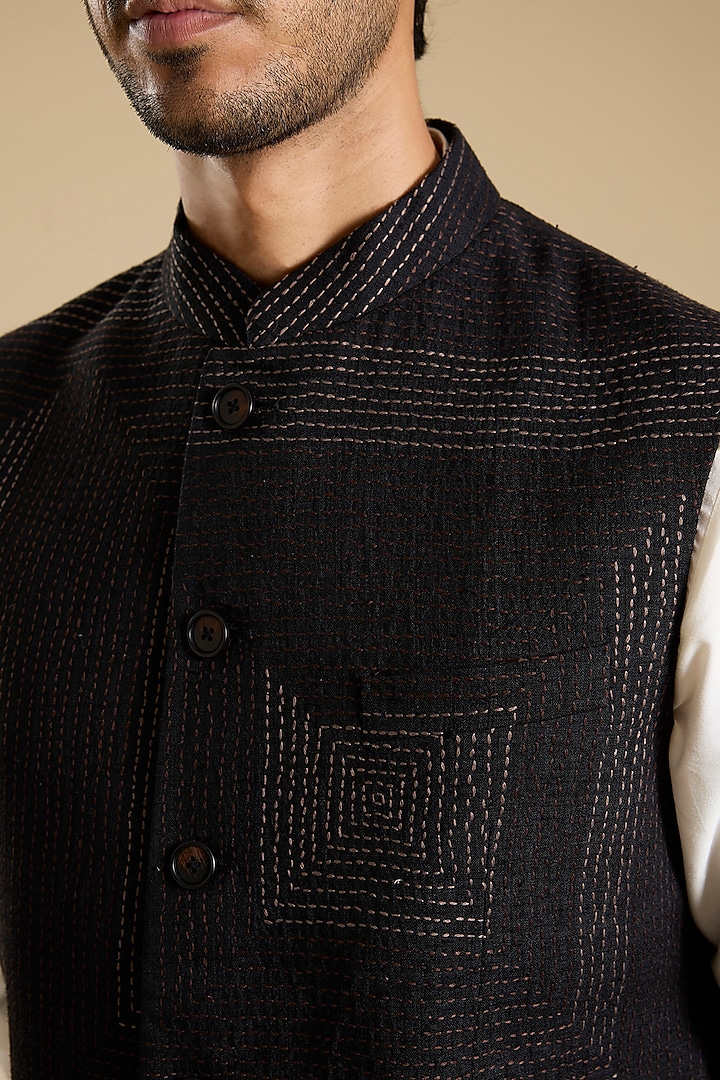 Black Raw Silk Kantha Embroidered Bundi Jacket by Divyam Mehta Men at Pernia's Pop Up Shop