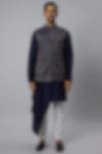 Blue Raw Silk Bundi Jacket Set by Divyam Mehta Men at Pernia's Pop Up Shop