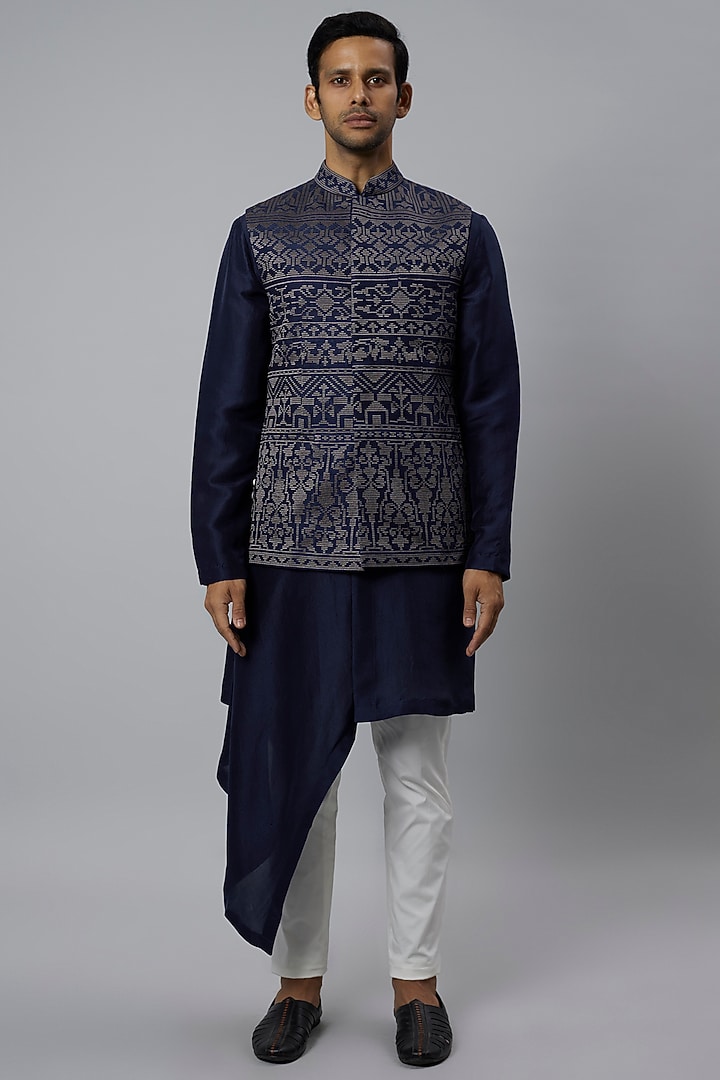 Blue Raw Silk Bundi Jacket Set by Divyam Mehta Men at Pernia's Pop Up Shop