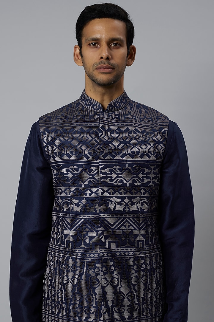 Blue Raw Silk Bundi Jacket Set by Divyam Mehta Men at Pernia's Pop Up Shop