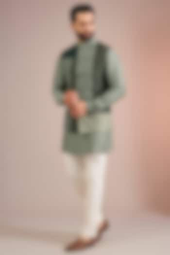 Bottle Green Mulberry Silk Bundi Jacket Set by Divyam Mehta Men at Pernia's Pop Up Shop