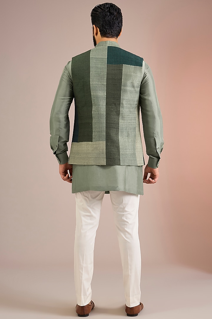 Bottle Green Mulberry Silk Bundi Jacket Set by Divyam Mehta Men at Pernia's Pop Up Shop