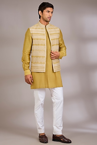 Haldi Yellow Silk Bundi Jacket Set by Divyam Mehta Men