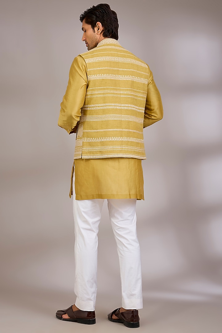 Haldi Yellow Silk Bundi Jacket Set by Divyam Mehta Men at Pernia's Pop Up Shop