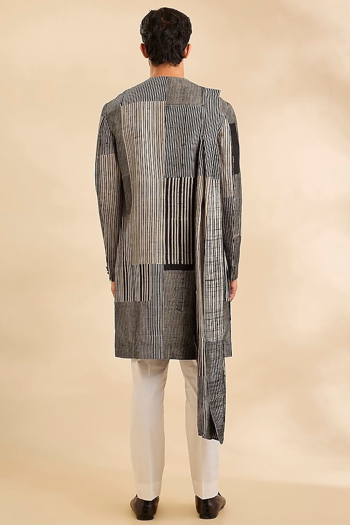 Black & Beige Raw Silk Kurta Set by Divyam Mehta Men at Pernia's Pop Up Shop
