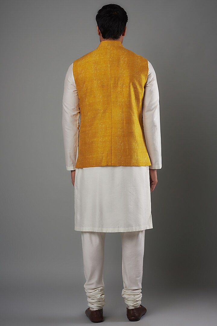Haldi Yellow Raw Silk Nehru Jacket by Divyam Mehta Men at Pernia's Pop Up Shop