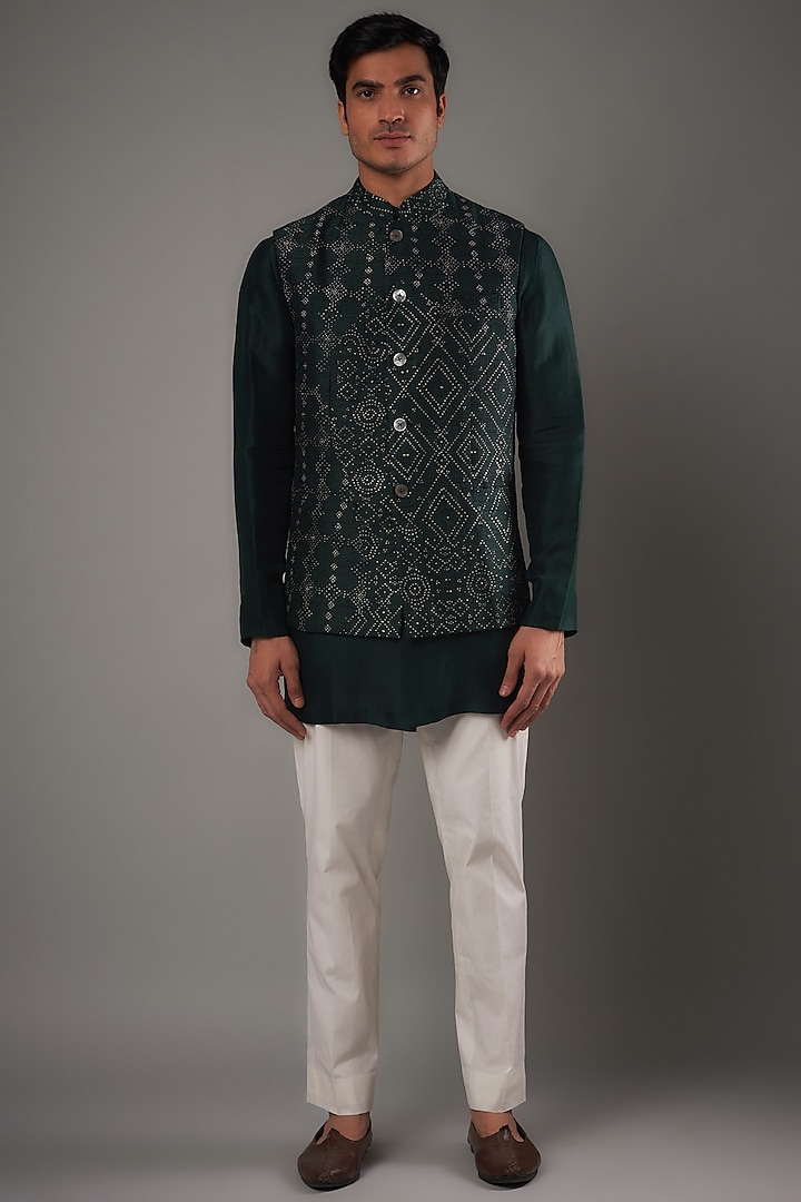 Bottle Green Raw Silk Printed Bundi Jacket Set by Divyam Mehta Men