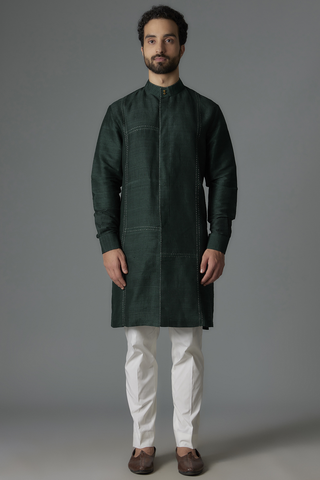 Bottle Green Raw Silk Kurta Set by Divyam Mehta Men