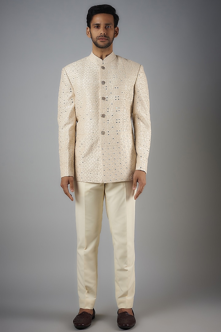 Ivory Raw Silk Embroidered Bandhgala Set by Divyam Mehta Men