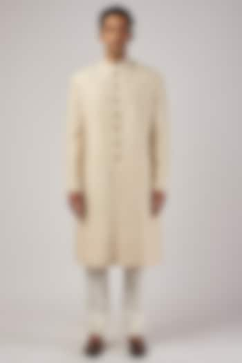 Ivory Raw Silk & Katan Silk Embroidered Groom Sherwani Set by Divyam Mehta Men at Pernia's Pop Up Shop