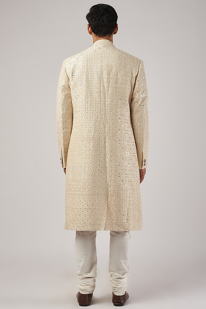 Ivory Raw Silk & Katan Silk Embroidered Groom Sherwani Set by Divyam Mehta Men at Pernia's Pop Up Shop