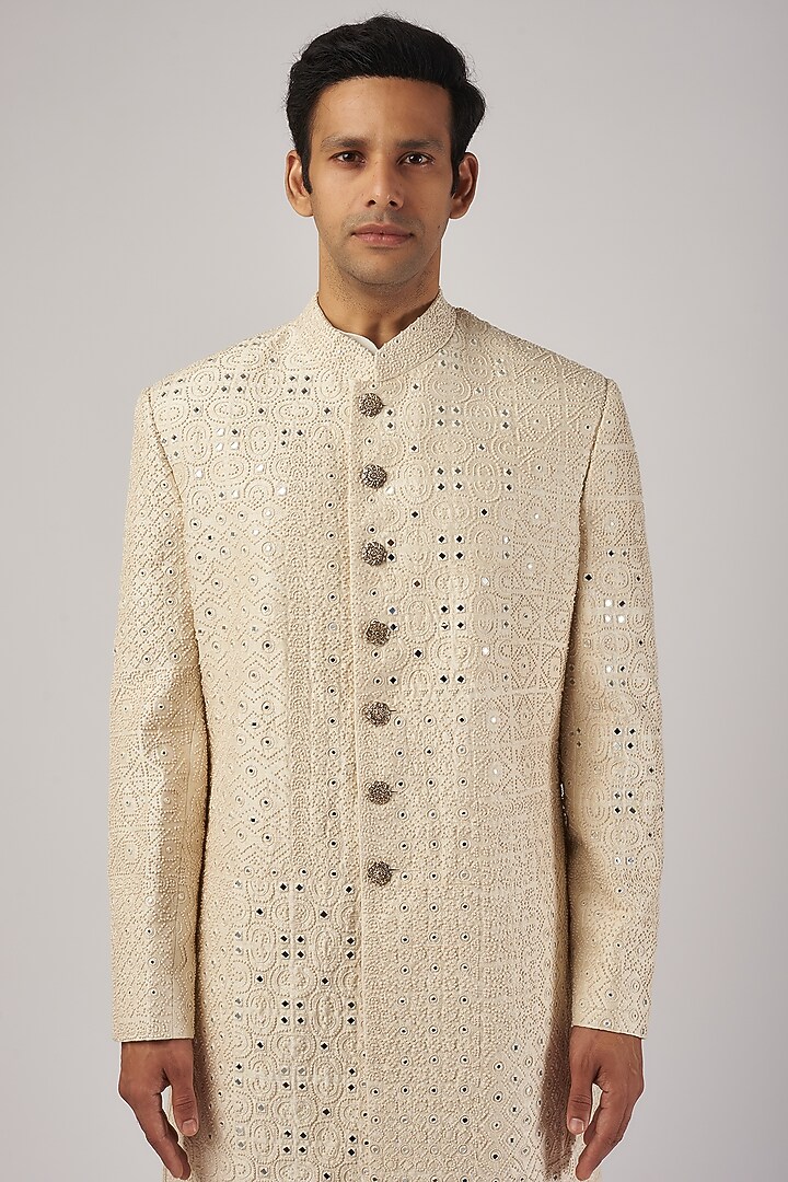 Ivory Raw Silk & Katan Silk Embroidered Groom Sherwani Set by Divyam Mehta Men at Pernia's Pop Up Shop