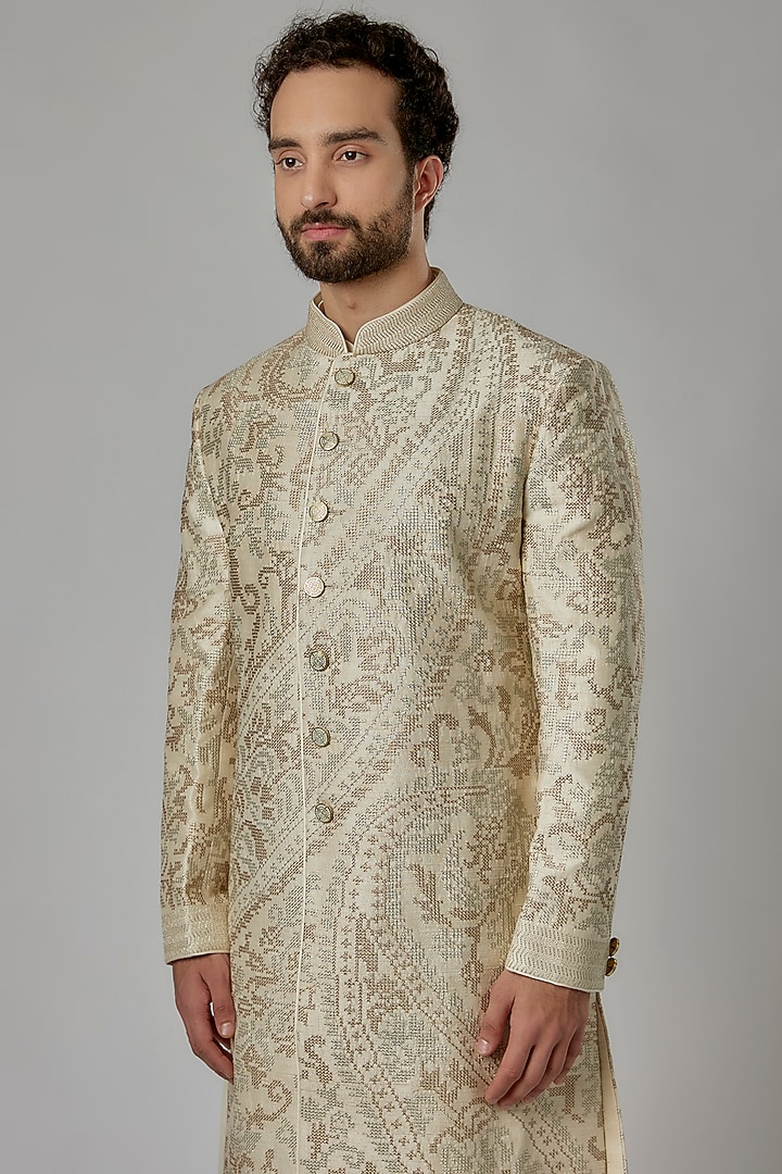 Ivory Raw Silk Groom Sherwani Set by Divyam Mehta Men at Pernia's Pop Up Shop