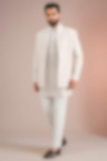 Pearl White Raw Silk Groom Indowestern Set by Divyam Mehta Men at Pernia's Pop Up Shop