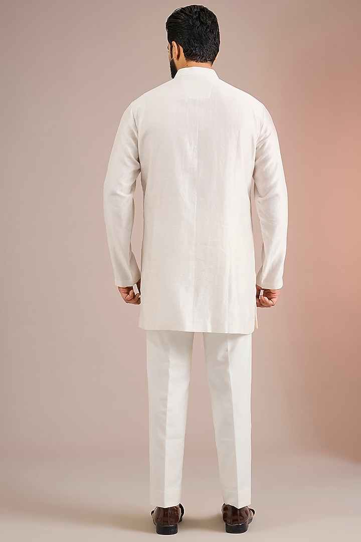 Pearl White Raw Silk Groom Indowestern Set by Divyam Mehta Men at Pernia's Pop Up Shop