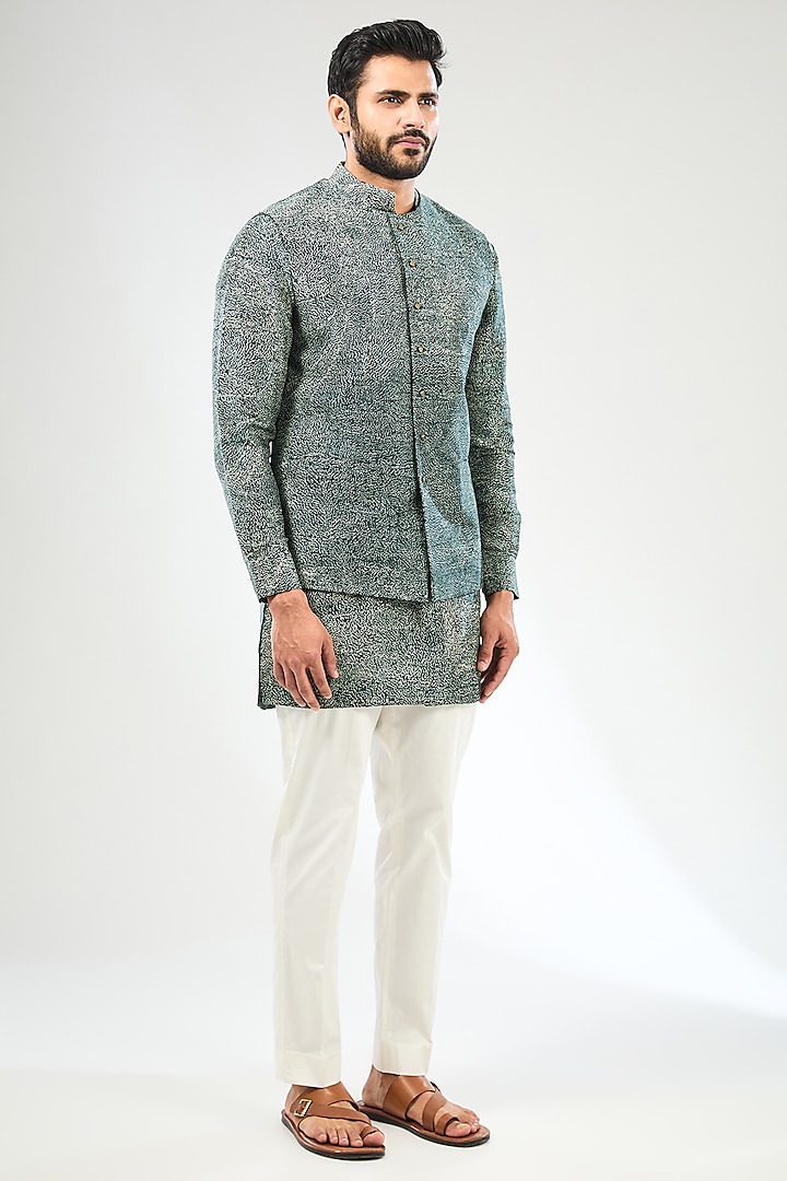 Green Silk Bundi Jacket Set by Divyam Mehta Men