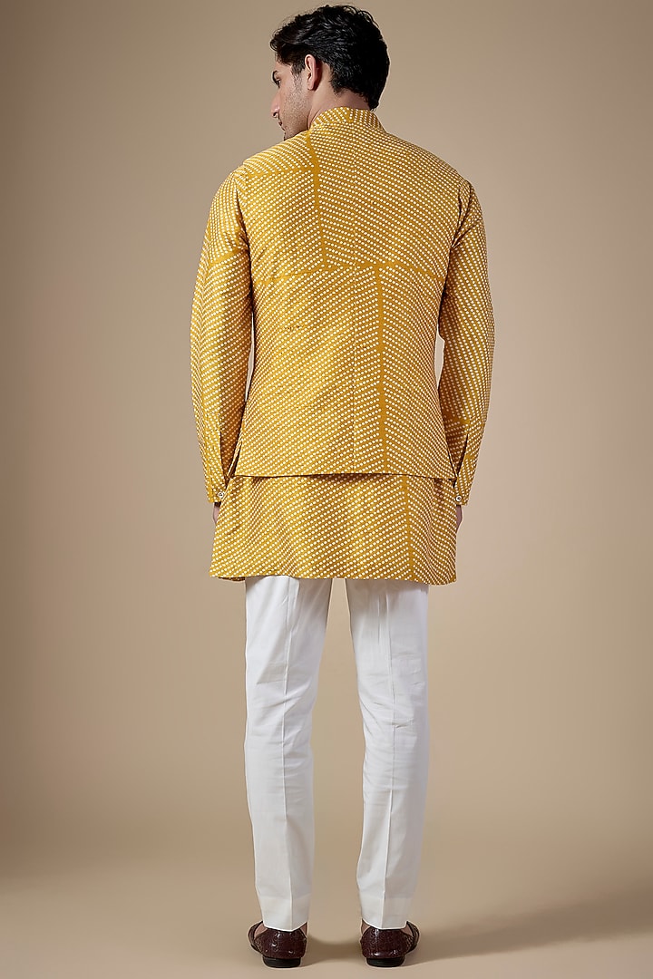 Haldi Yellow Raw Silk Bundi Jacket Set by Divyam Mehta Men at Pernia's Pop Up Shop