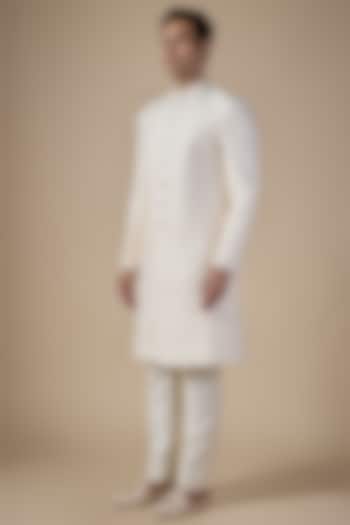 Ivory Raw Silk Groom Sherwani Set by Divyam Mehta Men at Pernia's Pop Up Shop