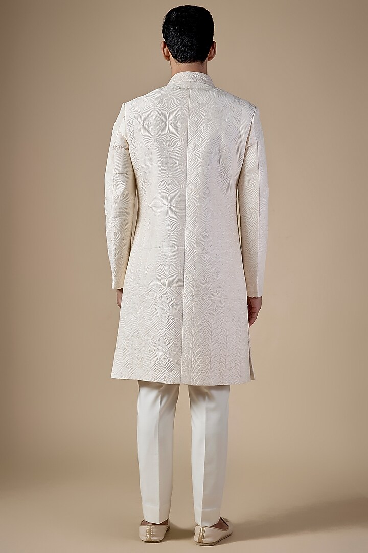 Ivory Raw Silk Groom Sherwani Set by Divyam Mehta Men at Pernia's Pop Up Shop