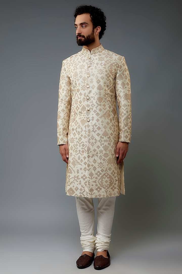 Ivory Raw Silk Sherwani Set by Divyam Mehta Men