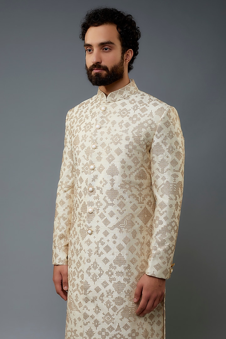 Ivory Raw Silk Groom Sherwani Set by Divyam Mehta Men at Pernia's Pop Up Shop