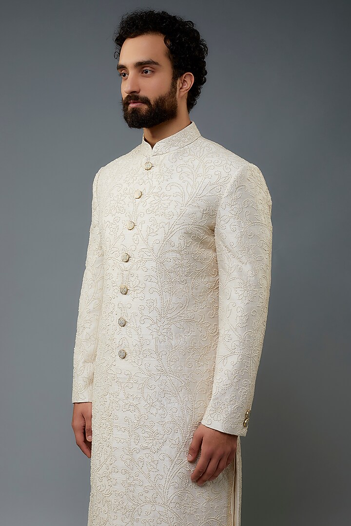 Ivory Raw Silk Groom Sherwani Set by Divyam Mehta Men at Pernia's Pop Up Shop