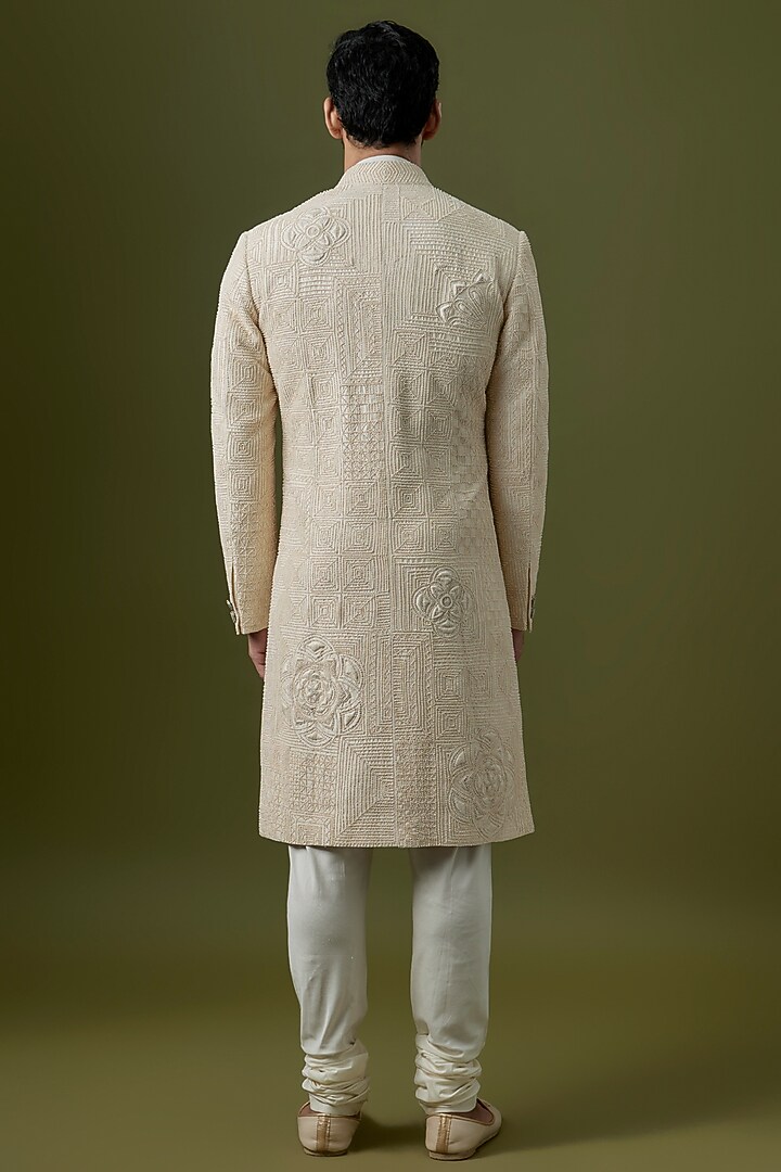 Ivory Raw Silk Groom Sherwani Set by Divyam Mehta Men at Pernia's Pop Up Shop