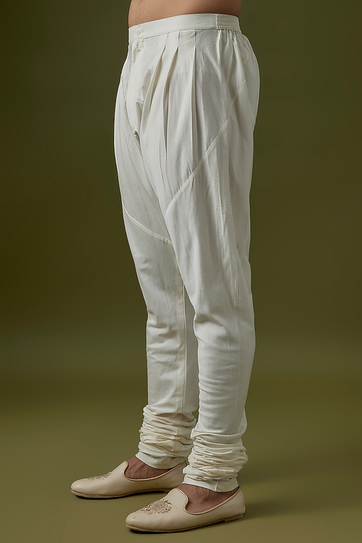Ivory Raw Silk Groom Sherwani Set by Divyam Mehta Men at Pernia's Pop Up Shop