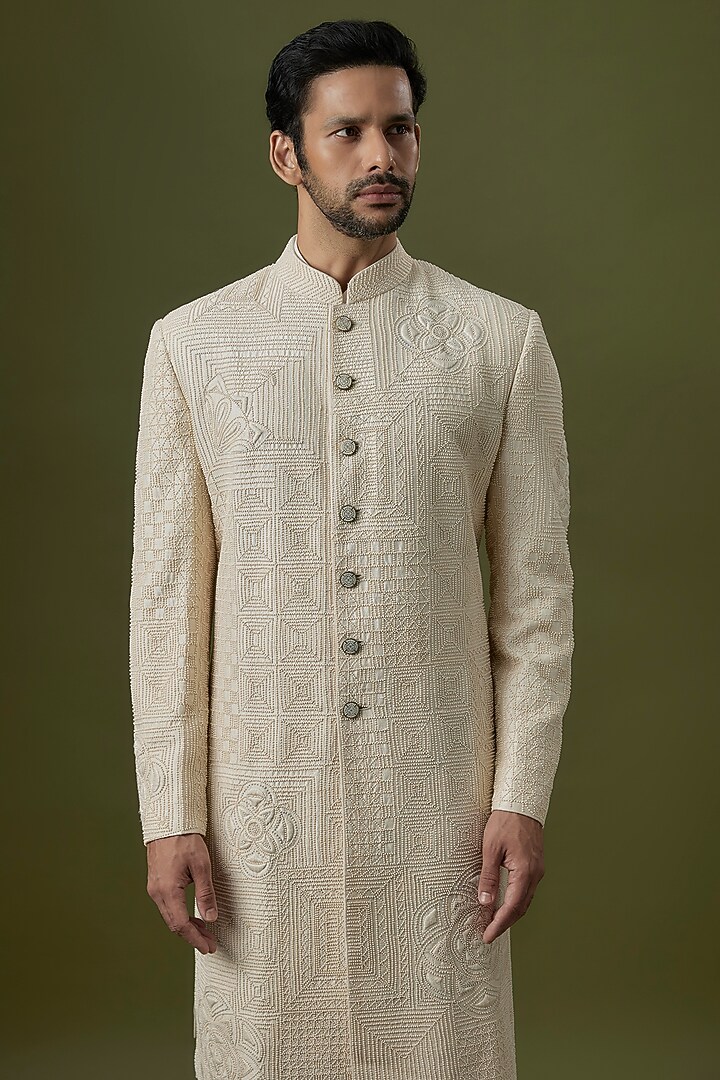 Ivory Raw Silk Groom Sherwani Set by Divyam Mehta Men at Pernia's Pop Up Shop