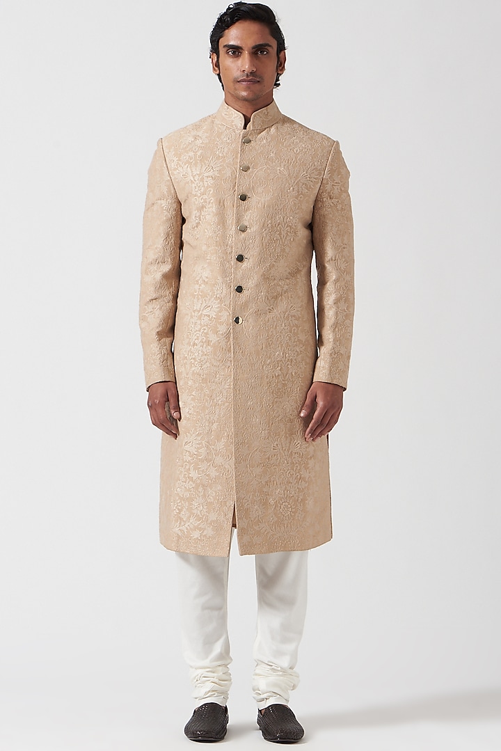 Beige Raw Silk Floral Thread Embroidered Sherwani Set by Divyam Mehta Men