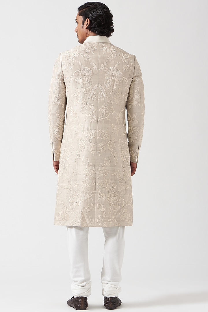 Chandi Silver Raw Silk Floral Thread Embroidered Groom Sherwani Set by Divyam Mehta Men at Pernia's Pop Up Shop