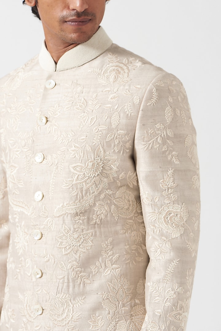 Chandi Silver Raw Silk Floral Thread Embroidered Groom Sherwani Set by Divyam Mehta Men at Pernia's Pop Up Shop