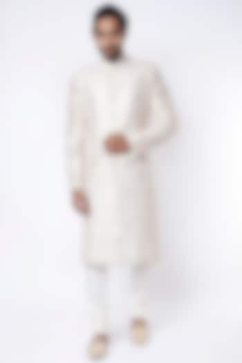 White Raw Silk Sherwani Set by Divyam Mehta Men