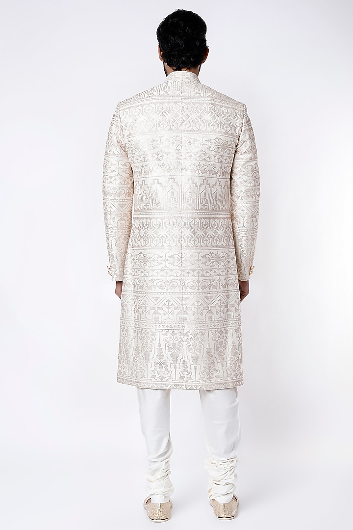 White Raw Silk Groom Sherwani Set by Divyam Mehta Men at Pernia's Pop Up Shop