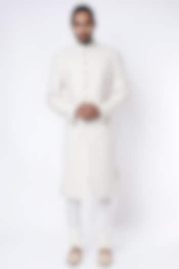 White Sherwani Set In Raw Silk by Divyam Mehta Men