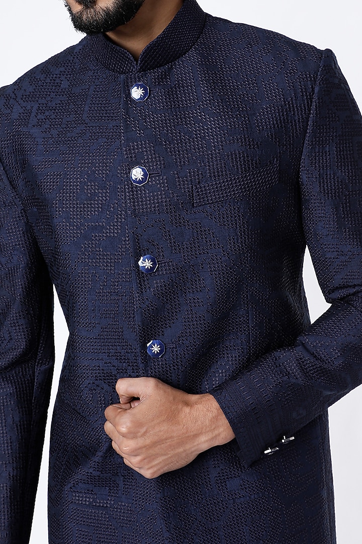 Blue Raw Silk Cross Stitch Embroidered Groom Bandhgala Set by Divyam Mehta Men at Pernia's Pop Up Shop
