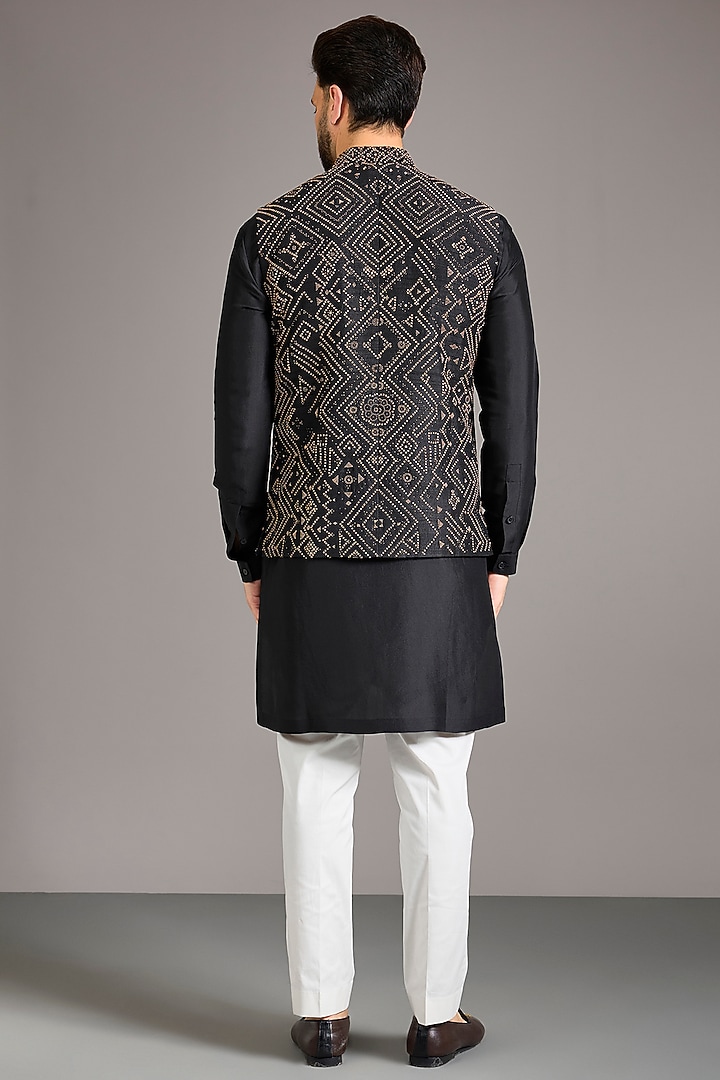Black Raw Silk Embroidered Bundi Jacket Set by Divyam Mehta Men at Pernia's Pop Up Shop