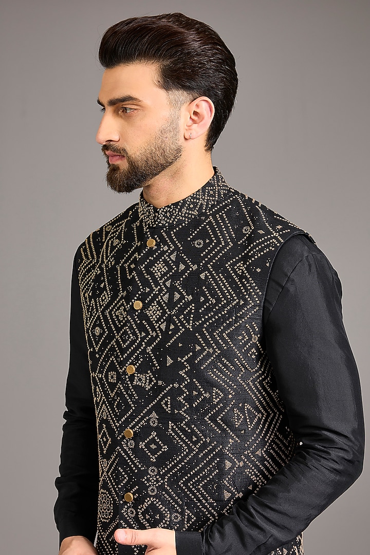 Black Raw Silk Embroidered Bundi Jacket Set by Divyam Mehta Men at Pernia's Pop Up Shop