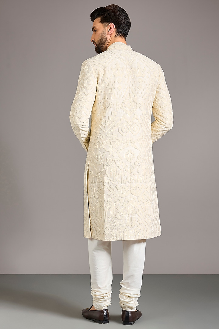 Ivory Raw Silk Groom Sherwani Set by Divyam Mehta Men at Pernia's Pop Up Shop