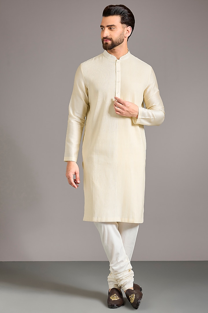 Ivory Raw Silk Groom Sherwani Set by Divyam Mehta Men at Pernia's Pop Up Shop