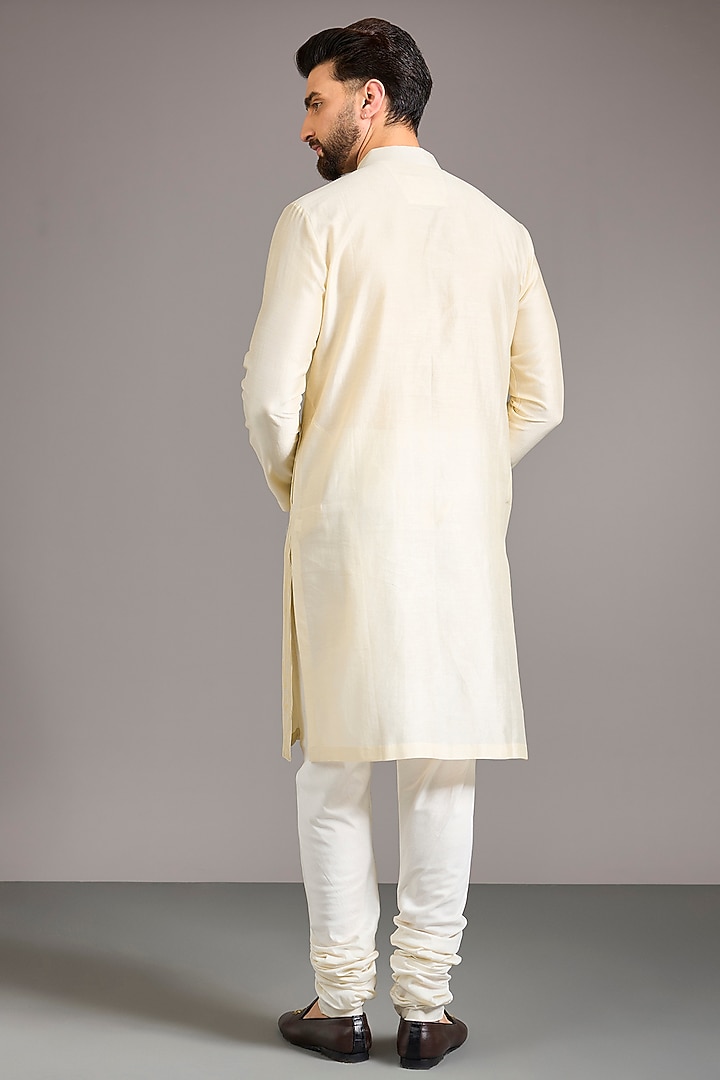 Ivory Raw Silk Groom Sherwani Set by Divyam Mehta Men at Pernia's Pop Up Shop