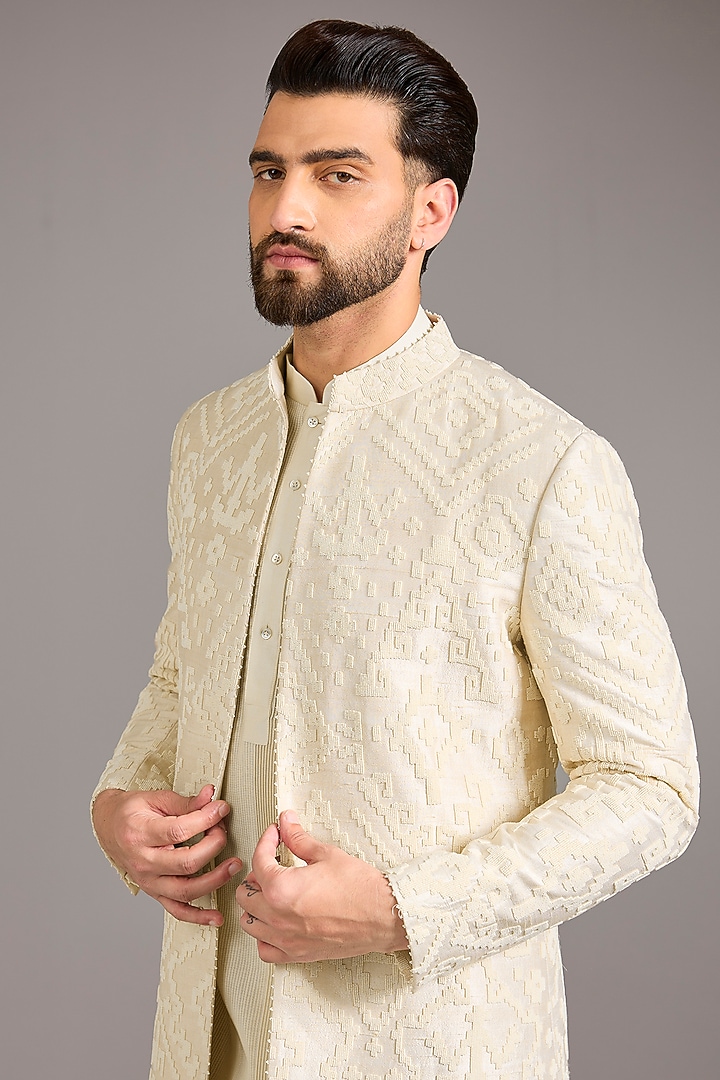 Ivory Raw Silk Groom Sherwani Set by Divyam Mehta Men at Pernia's Pop Up Shop