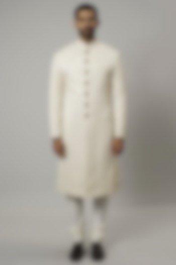 Ivory Raw Silk & Katan Silk Embroidered Sherwani Set by Divyam Mehta Men